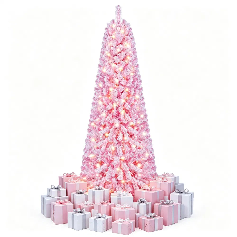 Rosa juletre med kunstsnø og lys