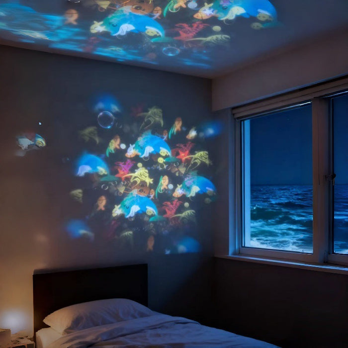 Varmegleden Roterende projektorlampe med julemotiver og snøfnugg
