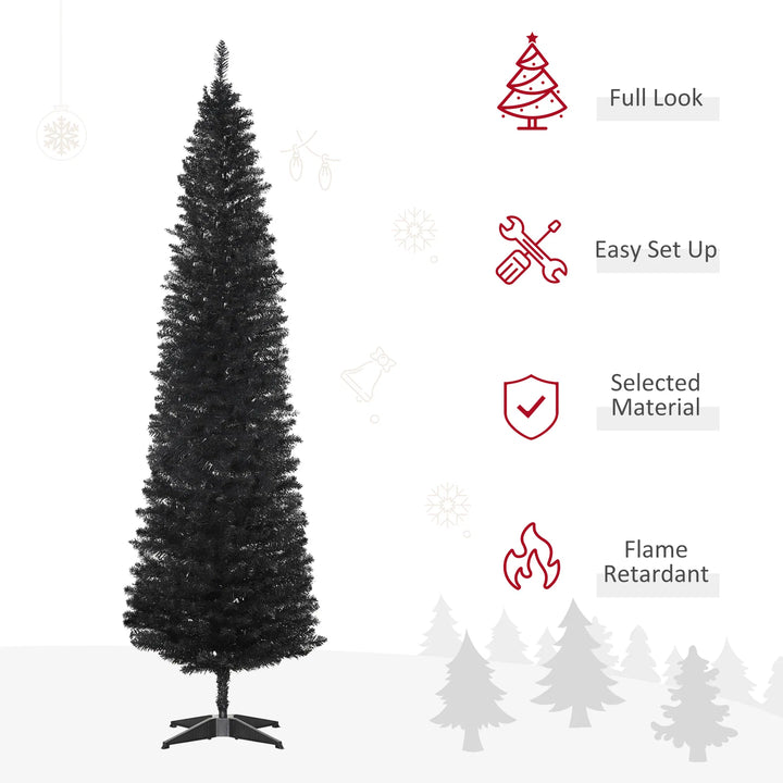 Slankt svart kunstig juletre i stue