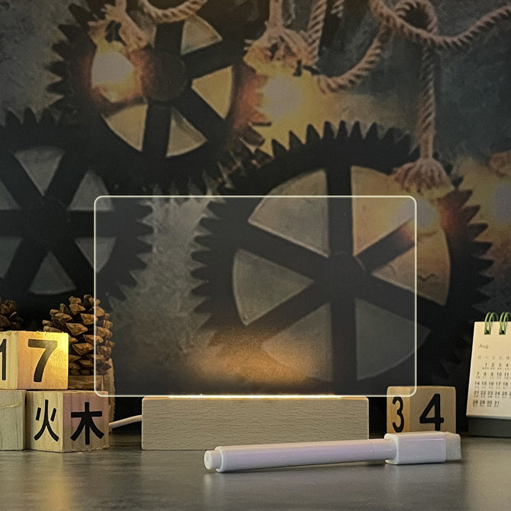Lysende akryltavle med håndskrevet beskjed