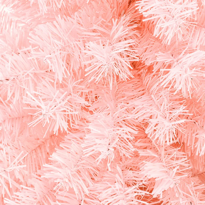 Rosa kunstig juletre i stue