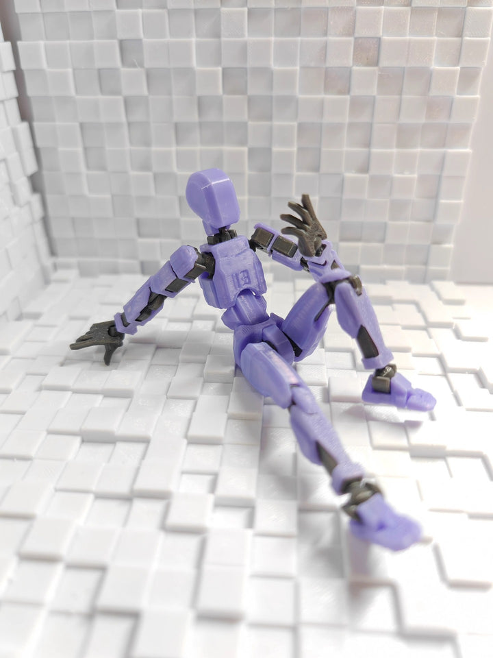 Bevegelig robotfigur i positur