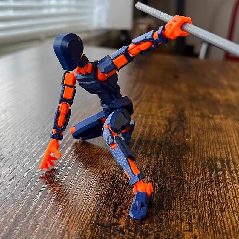 Bevegelig robotfigur i positur