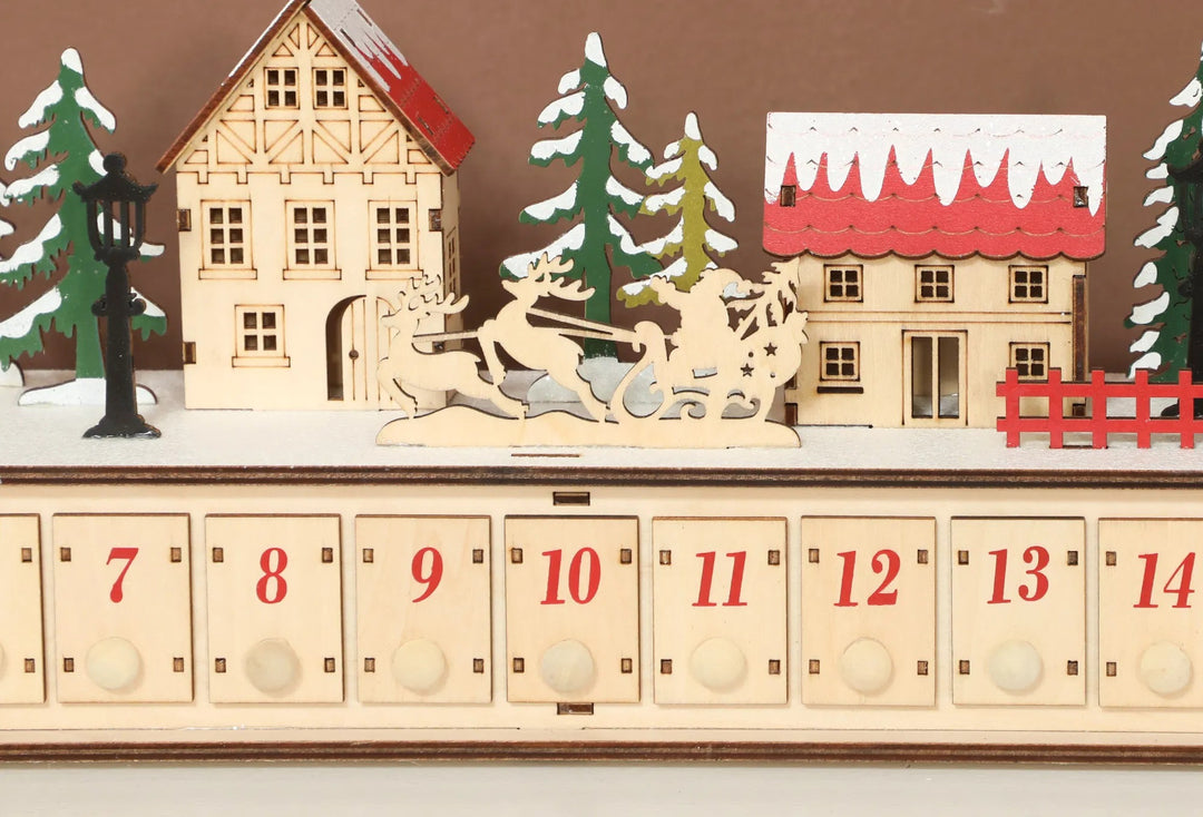 Lang adventskalender i tre med lys