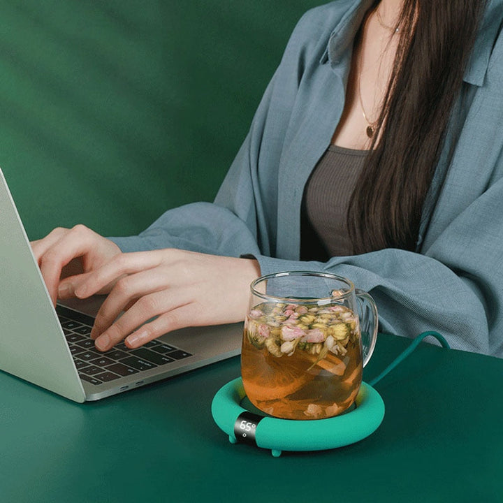 Varmegleden™ Søt koppvarmer i pastell som holder kaffe og te varm på pulten