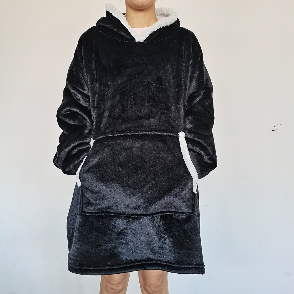 Oversized pleddgenser med hette og lomme