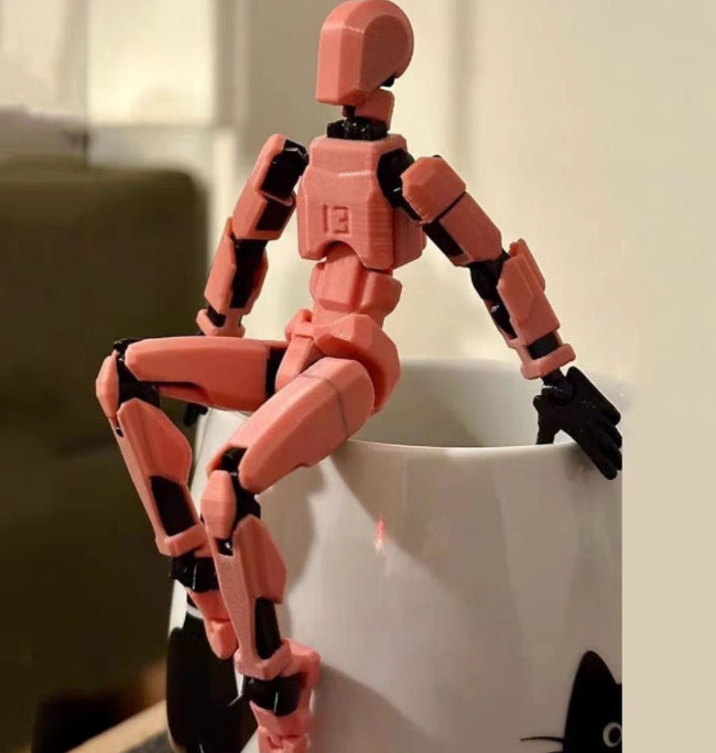 Bevegelig robotfigur i positur
