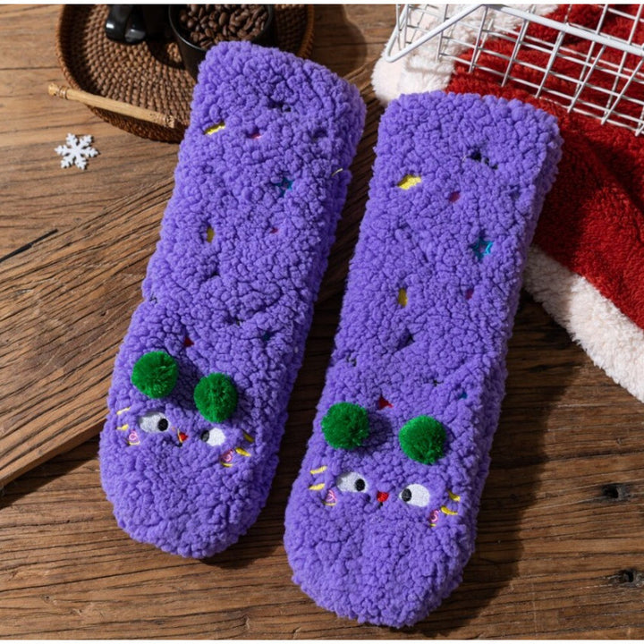 Lodne gule sokker med brodert fjes