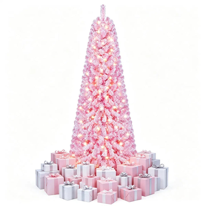 Rosa juletre med kunstsnø og lys