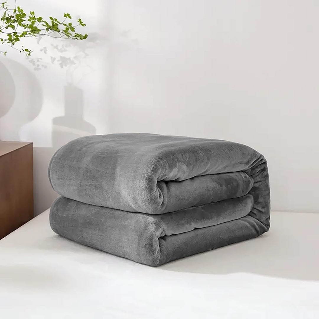 Varmegleden™ Myk fleecepledd i fuskepels til sofa og seng